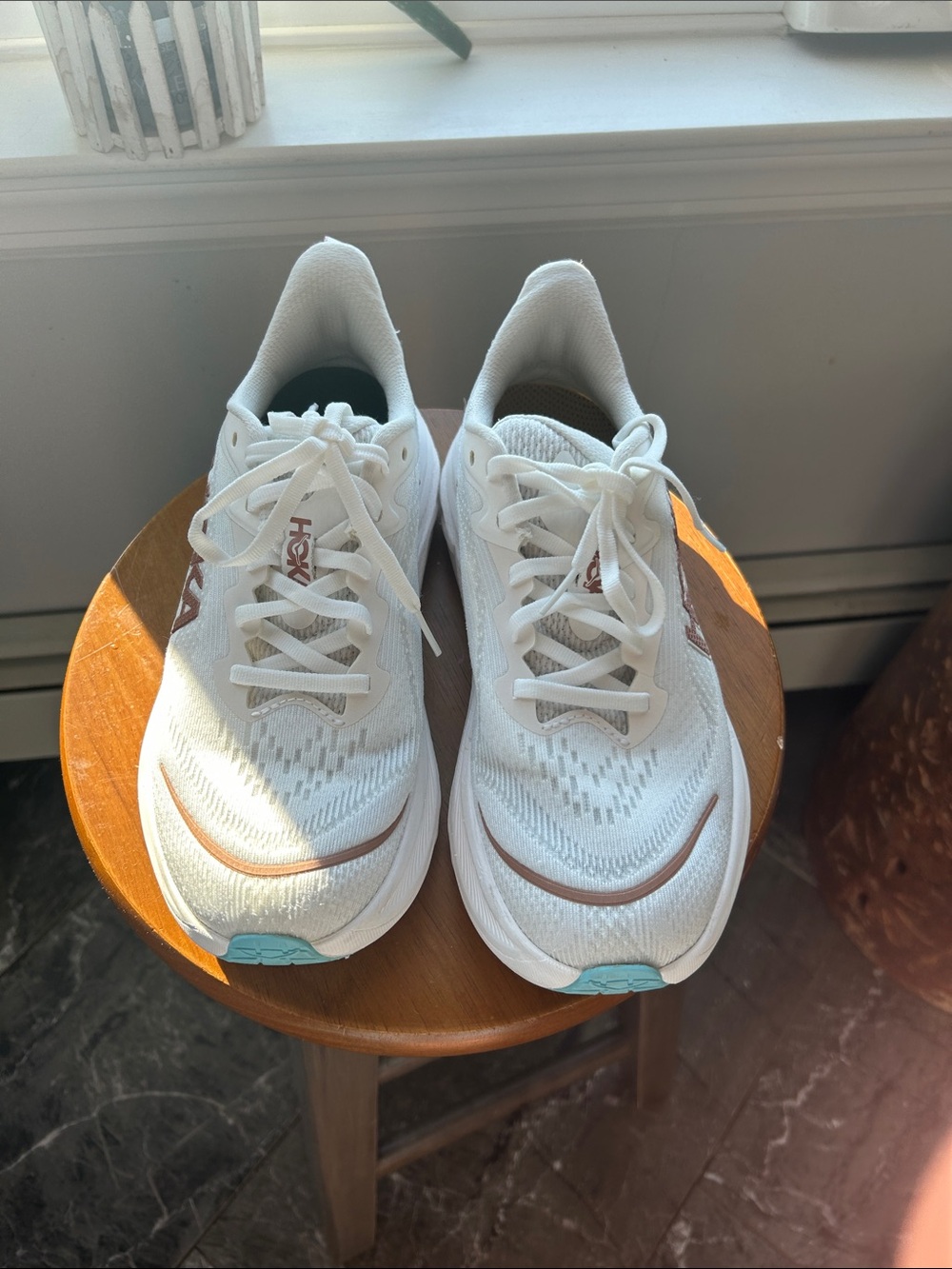 Hoka Women's White Running Shoes with Rose Gold and Light Blue Accents
